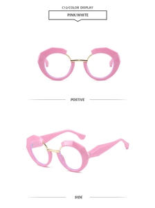 Detailed view of pink geometric frame sunglasses with gold metal bridge and side temple