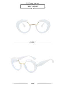 Detail of white polygon round sunglasses featuring thick geometric frames and metal bridge