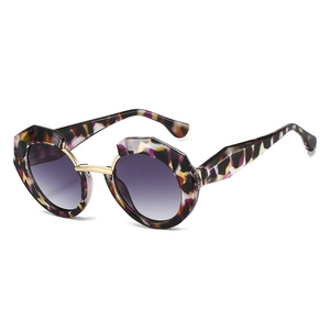 Vintage polygonal round sunglasses with purple gradient lenses and tortoise frame