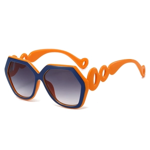 Fashionable oversized hexagonal sunglasses with blue-orange frames and gradient lenses