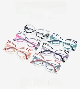 Detail view of six colorful cat-ear shaped spectacle frames in various trendy gradient colors