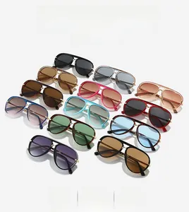 Flat lay of multiple retro aviator sunglasses with metal double bridge in diverse colors