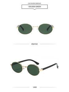 Detail view of gold metal oval sunglasses with green lenses and black temple tips