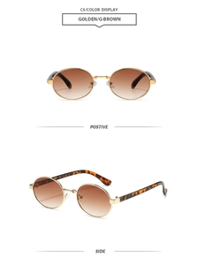 Detail view of retro oval sunglasses with gold metal frame and dark tortoiseshell temples