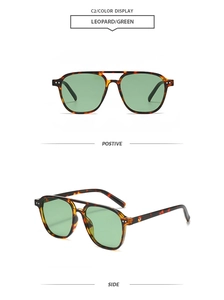 Detail view of leopard frame pilot sunglasses with green lenses and double bridge design