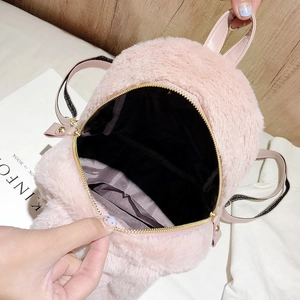 Pink plush bunny backpack with rabbit ears made of faux fur and golden zipper