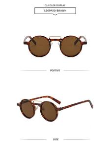 Detail view of leopard print round sunglasses with brown lenses and golden metal bridge