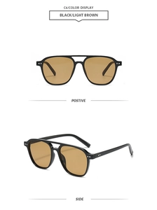 Close-up of vintage pilot sunglasses with double bridge and metal rivet details