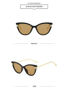Detail view showing black cat-eye sunglasses with light brown lenses and gold metal temples