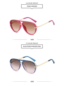 Side view of aviator sunglasses with pink and blue gradient frames and gold metal temples