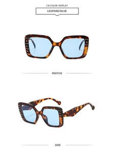 Detail of leopard print square sunglasses with blue lenses and side rhinestone accents