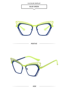 Detail of cat-eye metal glasses frame in neon green and blue C4 dual-tone finish