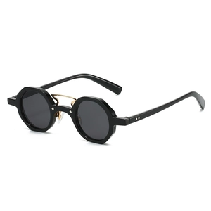 Modern octagonal sunglasses with black frames and gold double-bridge metal accents