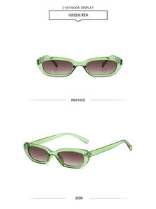 Detail of retro small frame green sunglasses with tea gradient lenses and slim temples