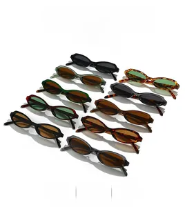 Flat lay display of retro oval cat eye sunglasses in ten different color variations