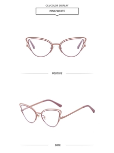 Detailed view of pink and white cat-eye metal sunglasses with dual-layer frame design