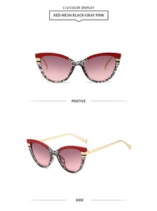 Detailed views of red cat-eye sunglasses with checkered pattern and gradient lenses