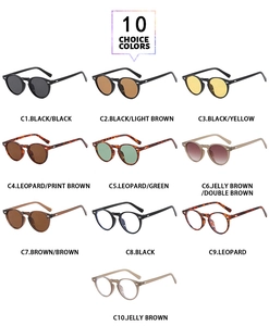 Collection of ten vintage round sunglasses in various frame colors and lens tints