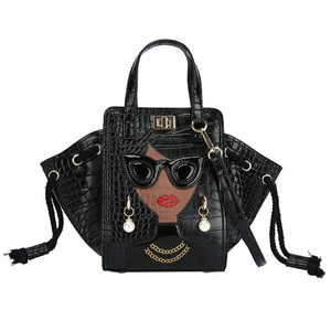 Crocodile texture wing tote bag with unique lady face pattern and pearl detail