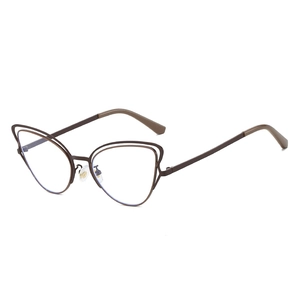Vintage brown metal cat eye sunglasses with a hollow frame design and trendy retro style