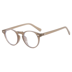 Retro round translucent tea brown sunglasses with classic frame and silver rivet details
