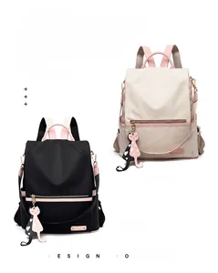 Détails des sacs à dos en nylon noir et rose avec d'adorables pendentifs chat pour femme