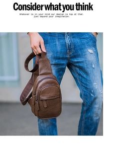 Close-up of brown PU leather sling bag showing lychee texture and multiple zipper pockets