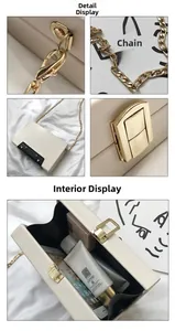 Detail view of cream rectangle crossbody bag with gold chain and black interior storage