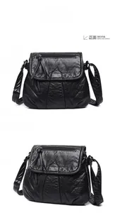 Detailed front and side views of a black wrinkled PU leather crossbody bag with zippers