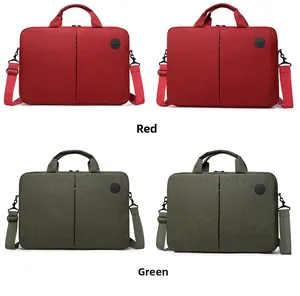 Detail view of red and green laptop bags with dual handles and metal buckles