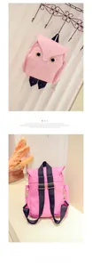 Vue détaillée du sac à dos hibou rose avec broderie en PU et ferrures dorées