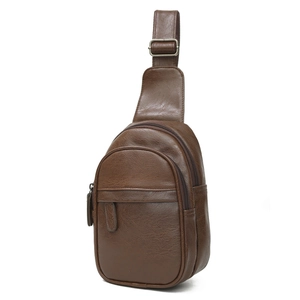 Brown faux leather crossbody chest bag with vintage pebble texture and adjustable strap
