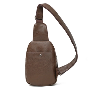 Brown leather sling bag for men with metal snap pocket and adjustable strap