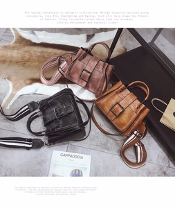 Three matte PU leather crossbody bags with stripe straps and large buckle detail