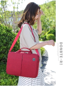 Burgundy business laptop bag for 15 inch notebook with shoulder strap and top handles