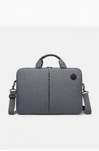 Detail of grey laptop bag with dual handles, vertical zip pocket and adjustable strap