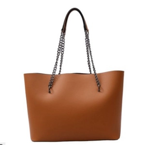 Brown faux leather tote bag with metal chain handles and a trapezoidal structure