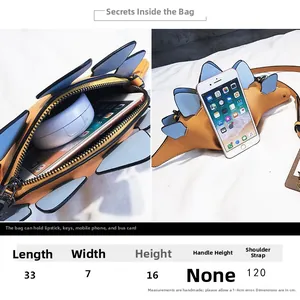 Detailed size chart for the yellow dinosaur crossbody bag with strap length measurements