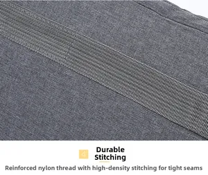 Detailed close-up of high-density stitching and nylon thread on gray laptop case