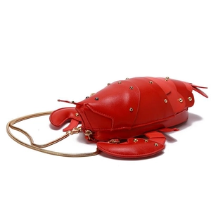 Cute red lobster crossbody bag with gold rivets and elegant chain strap for women
