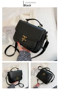 Close-up of black pebbled PU leather handbag featuring vintage bronze artistic lock detail