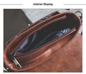 Detail show of brown PU leather shoulder bag interior with zipper pocket and printed lining