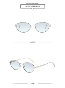 Detailed close-up of silvery oval metal sunglasses with gray blue gradient lenses