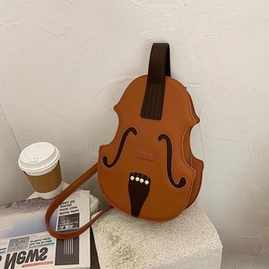 Retro violin shaped crossbody bag in brown PU leather with artistic guitar body design