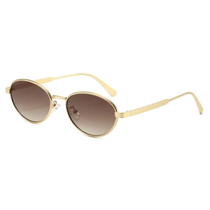 Fashionable oval metal sunglasses with gold frame and gradient brown lenses on white background