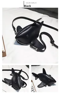 Detail view of funny black shark crossbody bag with polished PU leather and zip bottom