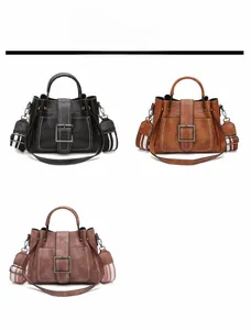 Three elegant vintage lady bags in black, brown, and pink with striped shoulder straps