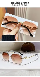 Detail of double brown rimless sunglasses with diamond-cut serrated edges and gold metal temple