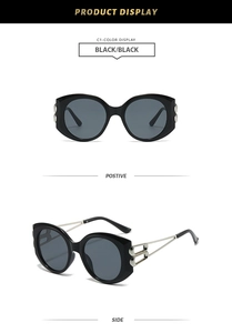Front and side view of oversized black sunglasses with silver hollowed metal temples