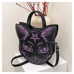 Macro detail of gothic black cat handbag with purple line art and pentagram star